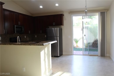 Kitchen with appliances with stainless steel finis