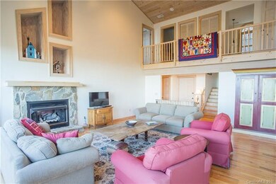 Gas Log Fireplace and Wood Floors in Great Room