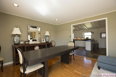 The Dining Room transitions to the Kitchen for eas