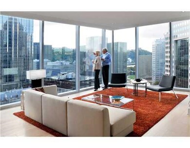 Living Room. Corner unit condominium with Floor to