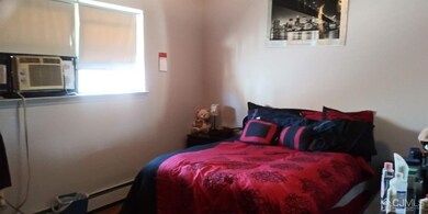 2nd floor, bedroom with tenant supplied window a/c