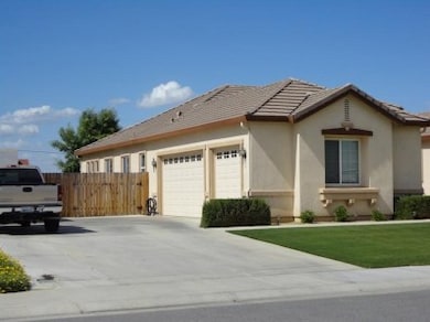Looking for space for those toys? Side load three car garage and huge RV space.
