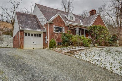 Brick traditional home with 1 car attached garage 