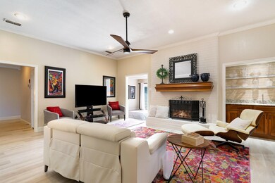 Living area a ceiling fan, recessed lighting, and 