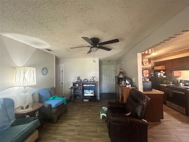 Living room featuring hardwood / wood-style floori