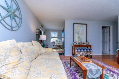 Living room opens to kitchen