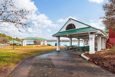 View of community featuring a gazebo, a yard, and