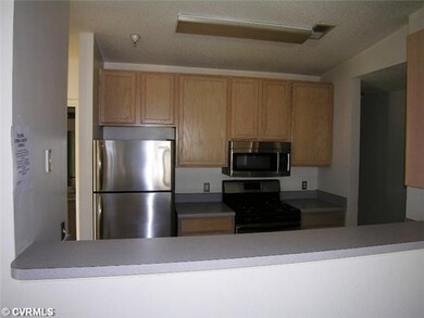 Kitchen - This shows the Bar area with view into t