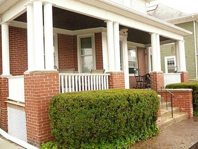 Exterior Front. New composite plank porch.