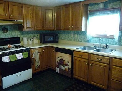 Kitchen. A great work triangle with ample work spa