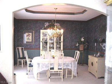 The formal dining room with an elegant feel.