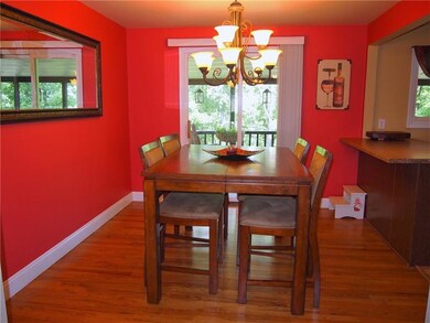 Open floor plan leads to dining room with slider t