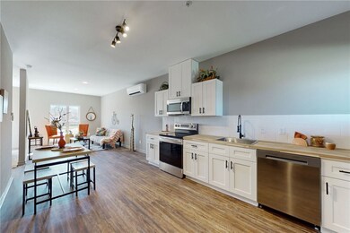 Kitchen featuring sink, appliances with stainless