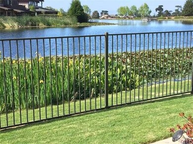 Fenced in lake view from the home