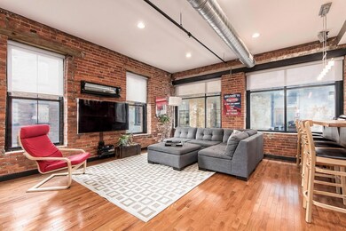 Great Room w/exposed brick