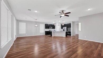 Large living room, open to the kitchen and dining