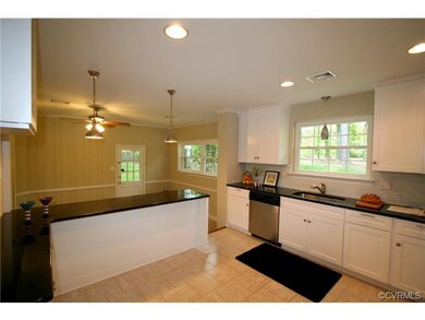 The open concept family/living area and kitchen is