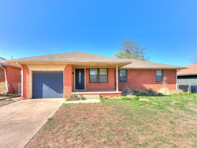 Single story home with a front lawn, a porch, conc