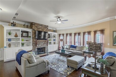 Family Room with Stone Fireplace and Gas Logs