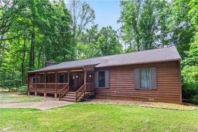 Ranch-style home with a front lawn