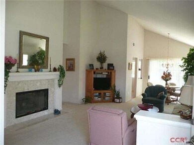 Nice bright living room with vaulted ceilings and 