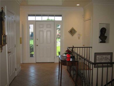 Entry/Foyer. Handsome foyer has side window lights