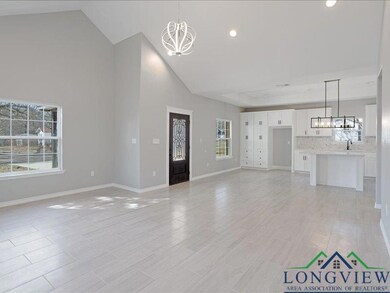 Unfurnished living room with plenty of natural lig