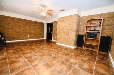 large sep den area for entertainment that leads to