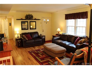 Family Room. Crown molding, hardwood floors, wood-