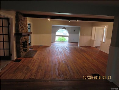 Looking from the Sitting room through the Living r