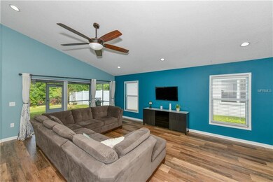 Brand new flooring complements this expansive room