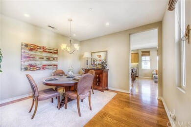 Elegant formal dining room with chandelier and rec