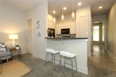 Great Kitchen Bar with glass pendant lights