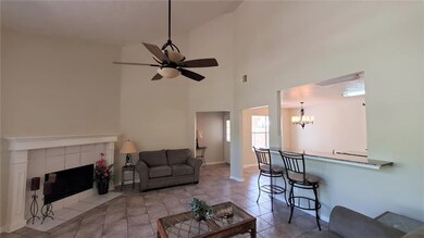 Living room with high ceilings, open concept and a