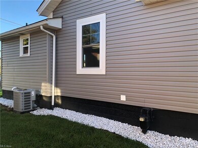 View of home's exterior featuring central AC
