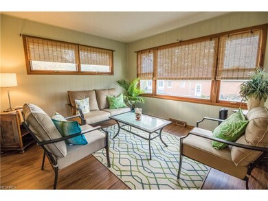 Recently renovated sun room is perfect for relaxin