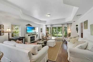 Bright living room with French doors leading to th