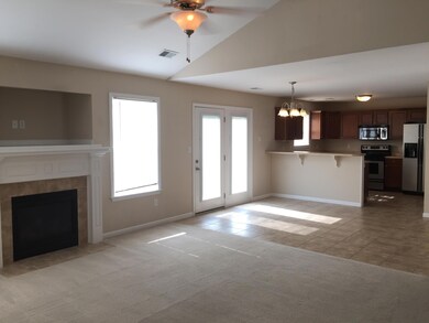 vaulted LR w/ gas fireplace