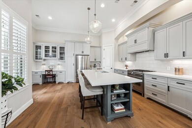 The kitchen is a chef’s dream, equipped w/ Bertazz