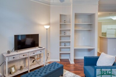 Great Room with desk and built in shelves