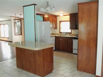 Kitchen opens to the formal dining room