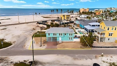 Birds eye view of property with a water view and a