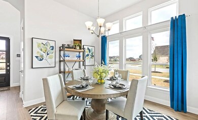 Dining area featuring light wood-type flooring and