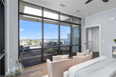 Primary Bedroom with access to 990 square feet of balcony complete with outdoor kitchen.  Wake up to the view of the Atlantic Ocean.