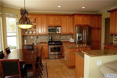 Gourmet kitchen with family dining.