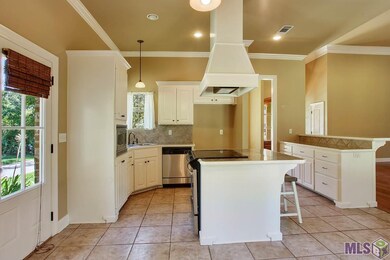 Your kitchen has lots of seating options with an i