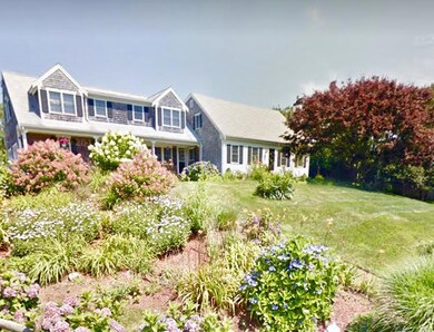 Stunning Cape w/professional landscaping