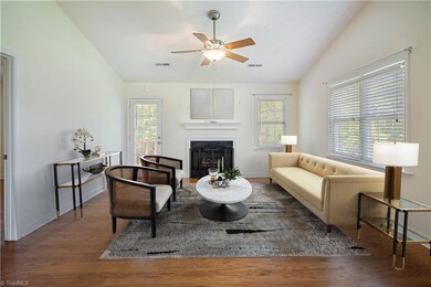 Living room with fireplace virtually staged