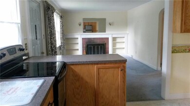 Looking from the kitchen to the...