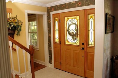 Foyer shows custom front entry